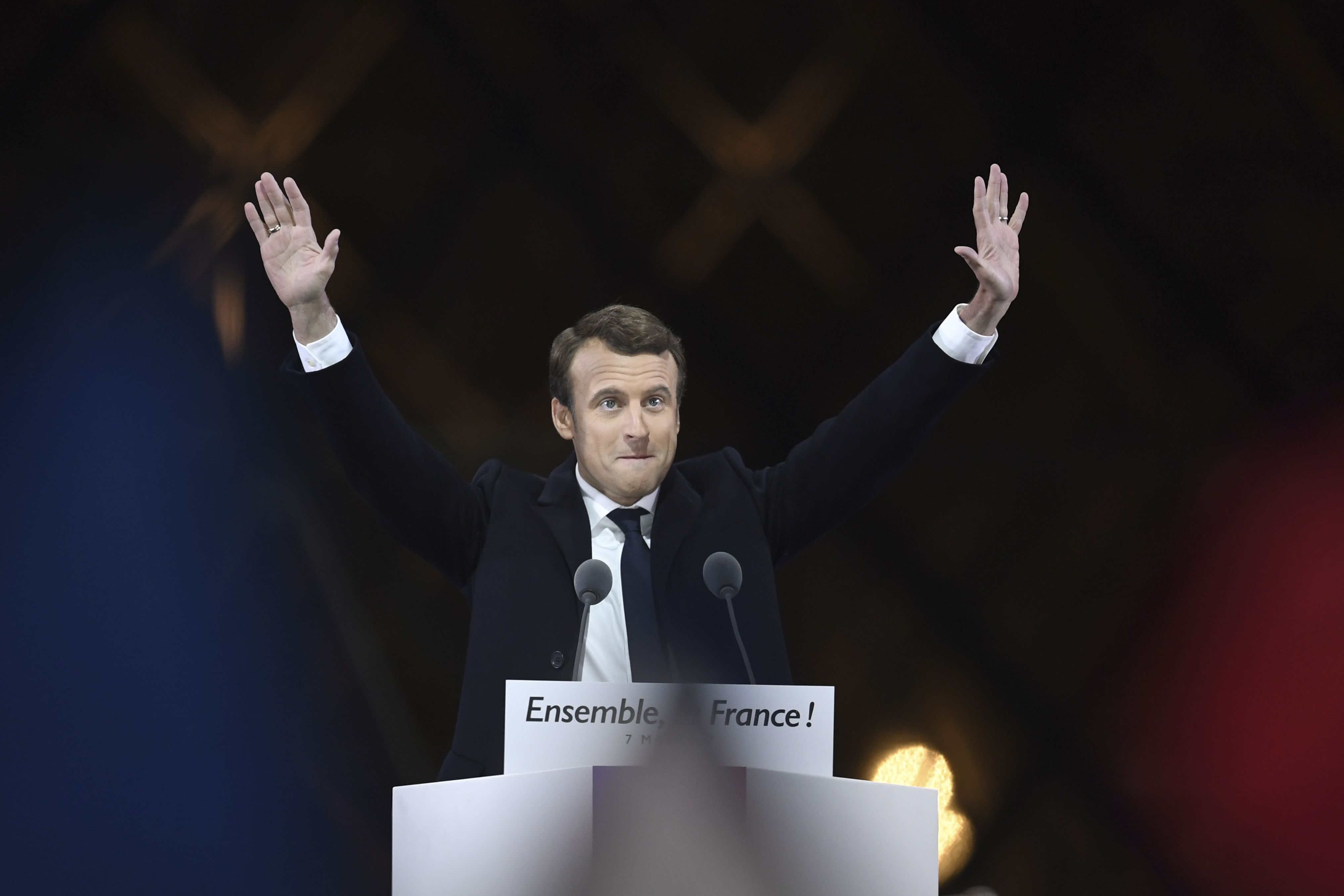 Emmanuel Macron greets supporters