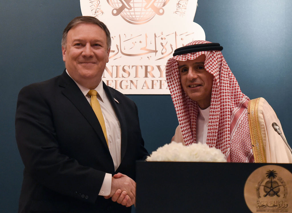 Saudi Foreign Minister Adel al-Jubeir (R) shakes hands with US Secretary of State Mike Pompeo 