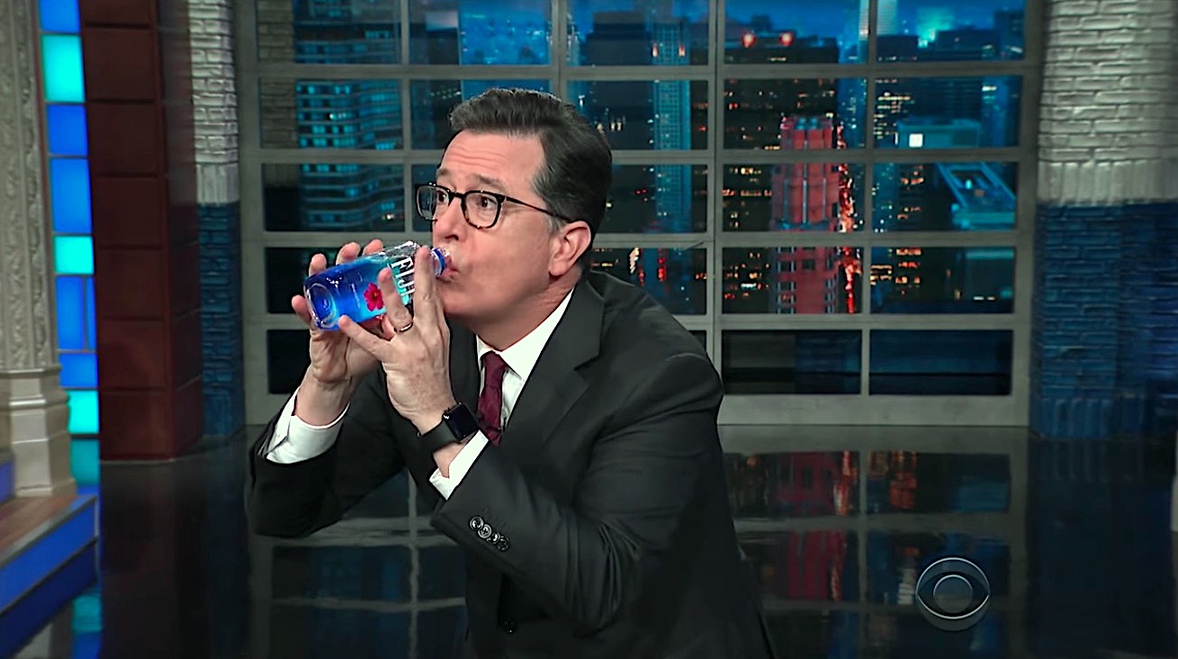 Stephen Colbert mimics Trump drinking water
