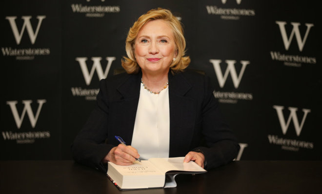 Hillary Clinton signs copies of her new book at Waterstones bookshop in London in July.
