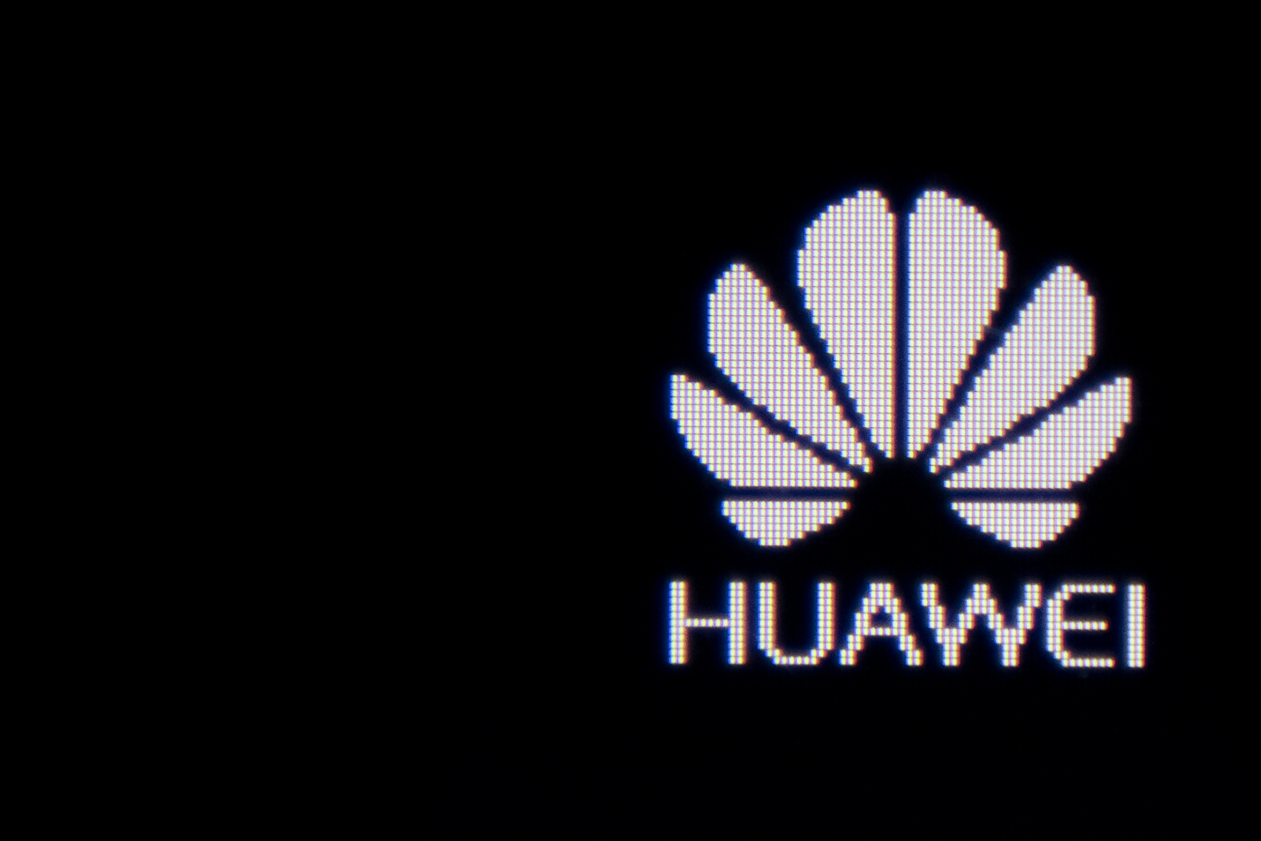 The Huawei logo on a screen