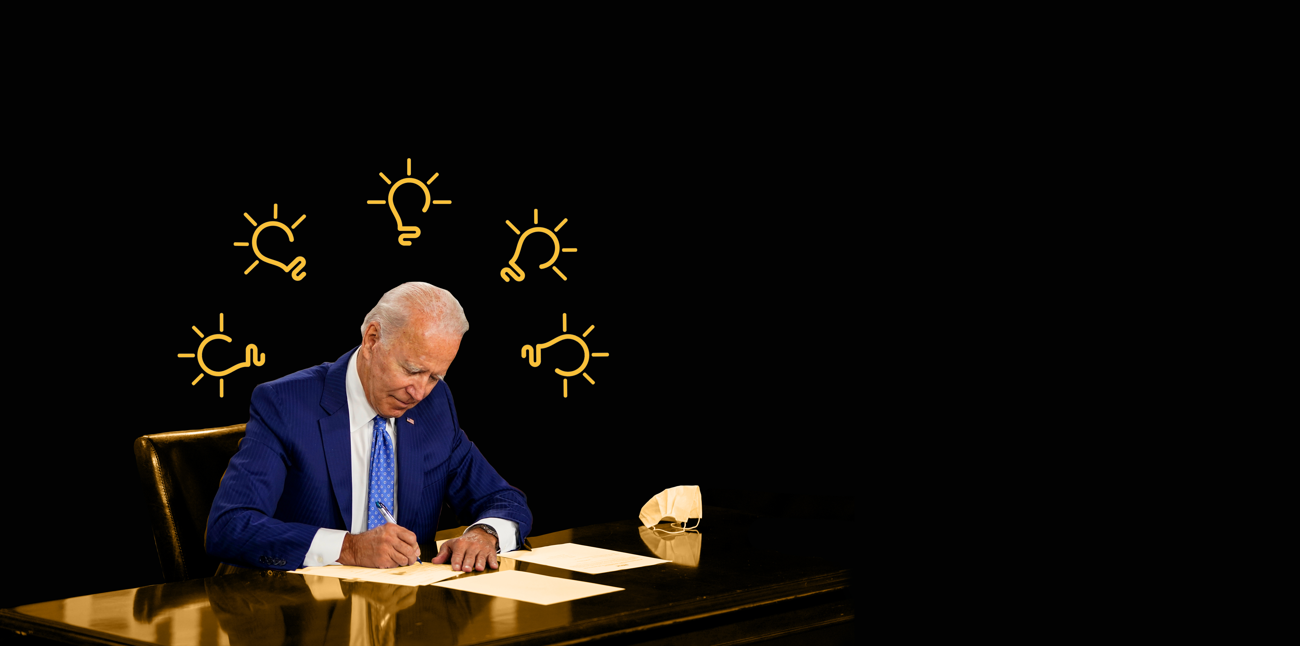 President-elect Joe Biden signs legislation.