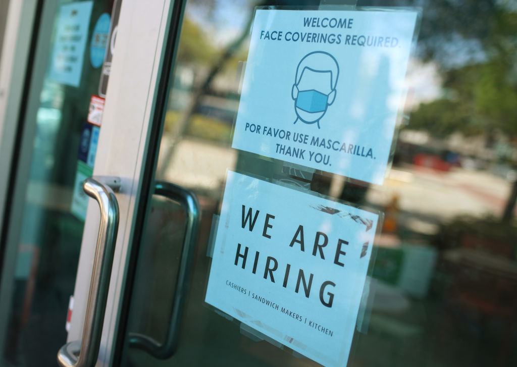 A &#039;we are hiring&#039; sign in front of a store on March 05, 2021 in Miami, Florida.