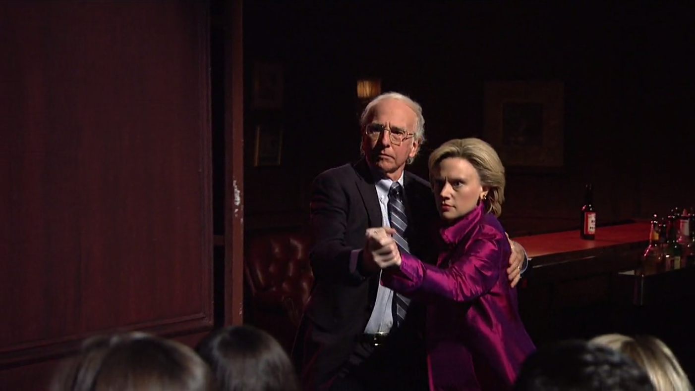 Larry David as Bernie Sanders and Kate McKinnon as Hillary Clinton