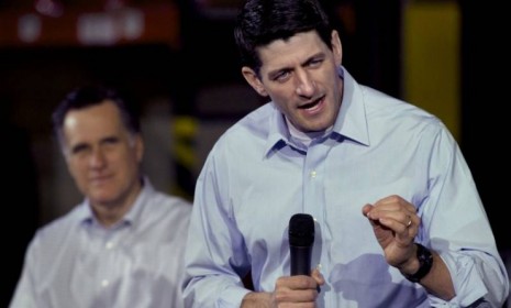Paul Ryan, (R-Wis.) addresses an audience at an oil company in Milwaukee as Mitt Romney looks on: Romney may be interested in Ryan as one of his top three choices for a VP nominee, but Ryan&#039;s