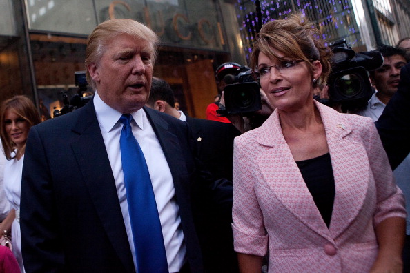 Sarah Palin is seen with Donald Trump. 