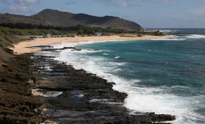 Water rushes to the shore at Sandy Beach Park in Honolulu, Hawaii.