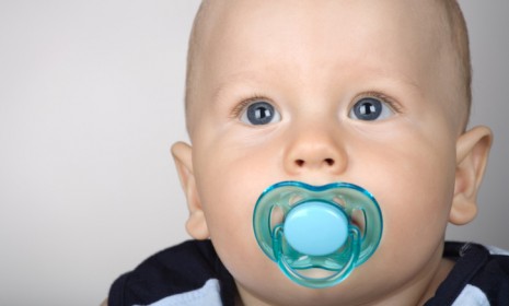 A baby with a pacifier