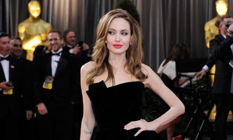 Angelina Jolie made a point of showing off her right leg during Sunday&#039;s Oscars, and the Twitterverse made a point of mocking her for it the next day. 