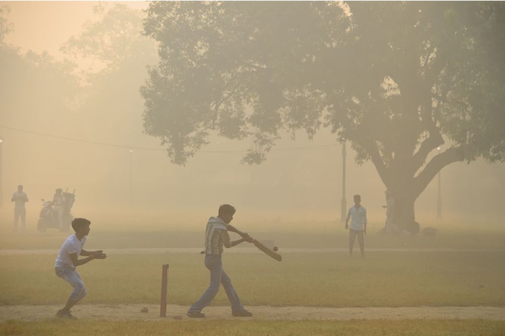 A cricket game amid heavy smog in Delhi.