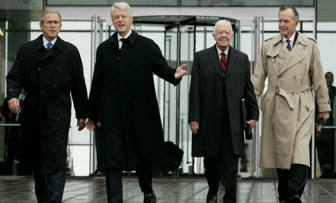 Former Presidents Bush Jr, Clinton, Carter, and Bush Sr at the start of the 2004 dedication ceremony for the Clinton Presidential Center in Little Rock.