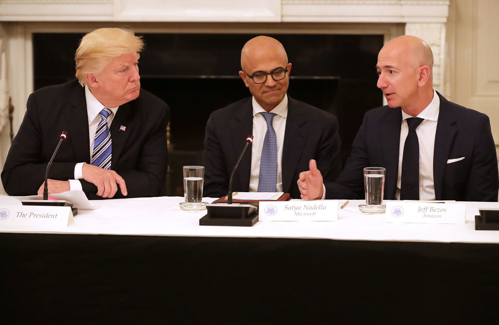 Trump listens to Jeff Bezos