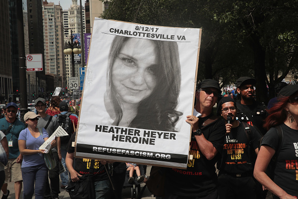 A poster with Heather Heyer&#039;s picture on it.