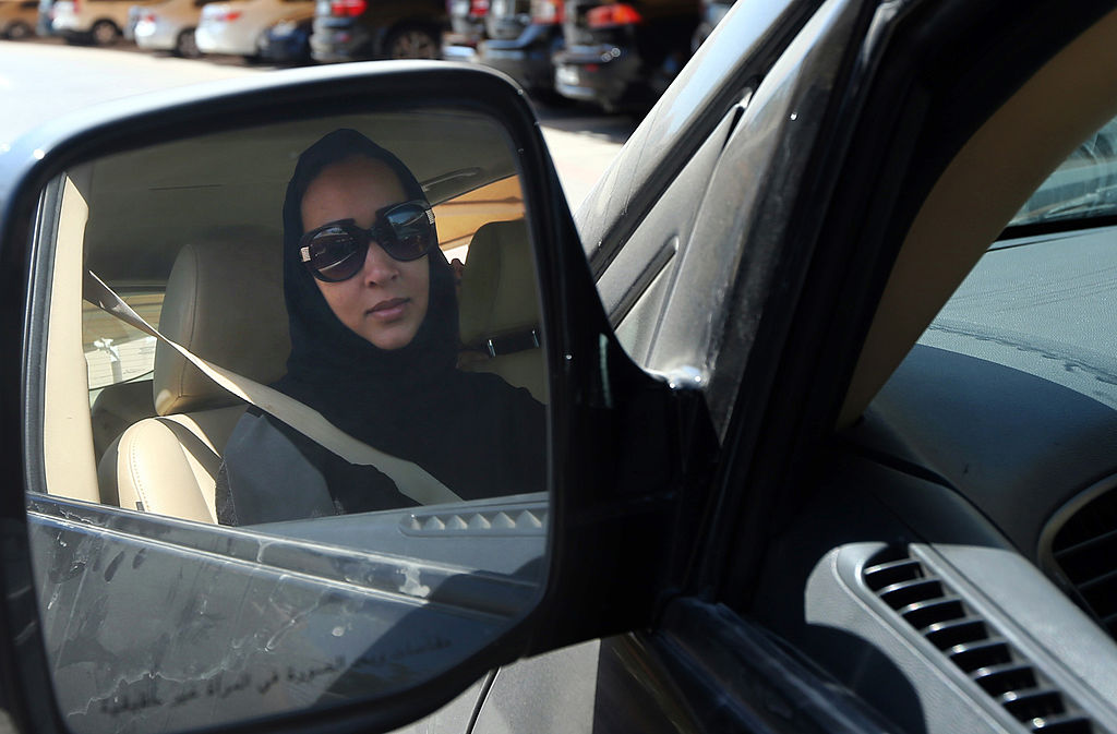 A Saudi woman driving a car. 