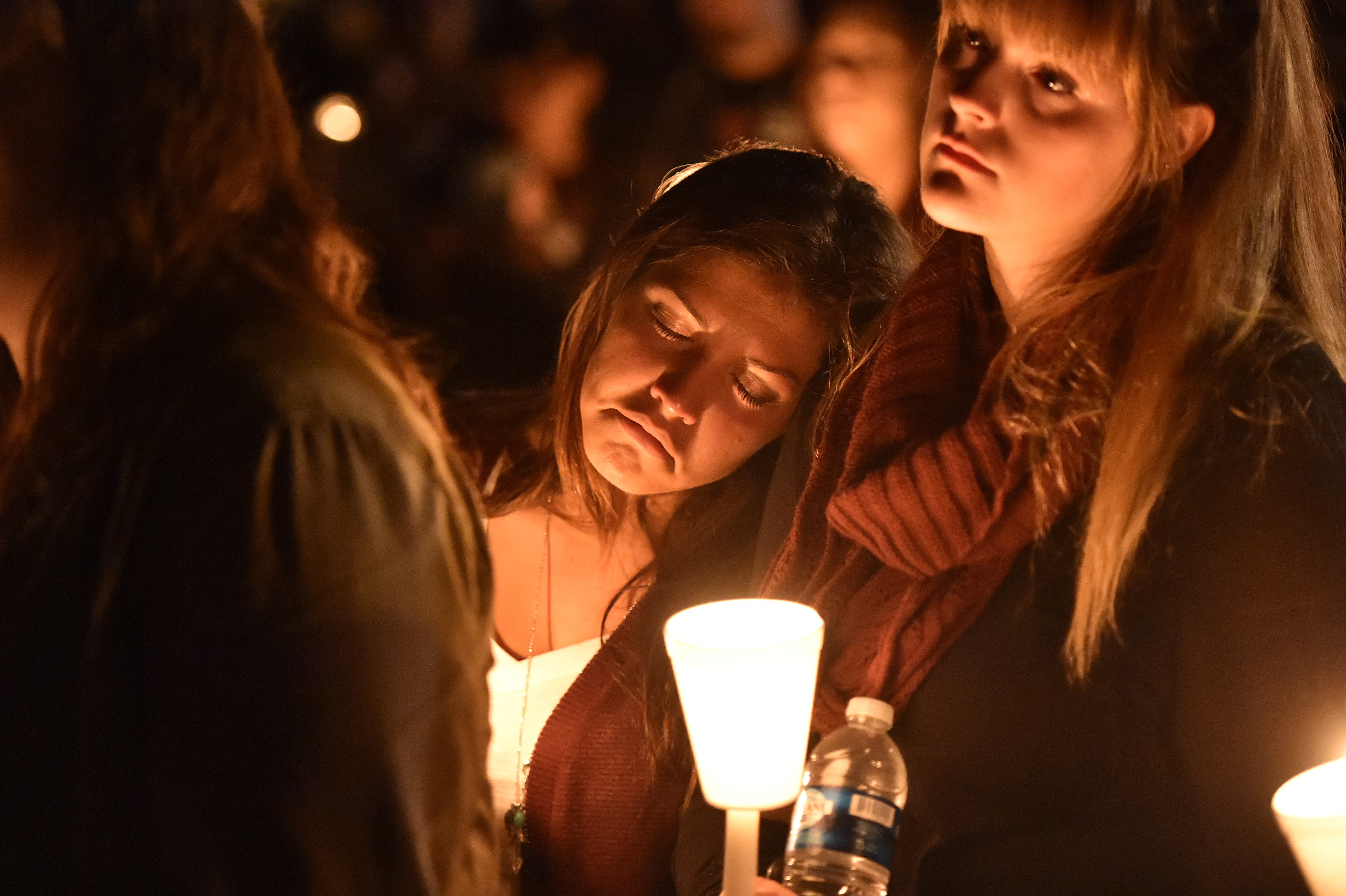 Mourners hold a candlelight vigil in Roseburg, Oregon, after the murder of nine people at Umpqua Community College