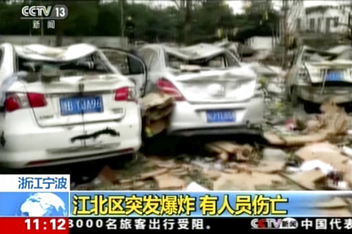 This image from video run by China&#039;s CCTV shows debris and damaged vehicles following an explosion in Ningbo in east China&#039;s Zhejiang province, Sunday, Nov. 26, 2017. 
