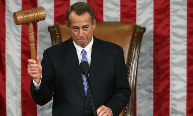 Speaker of the House John Boehner (R-Ohio) holds the gavel during the first session of the 113th Congress on Jan. 3