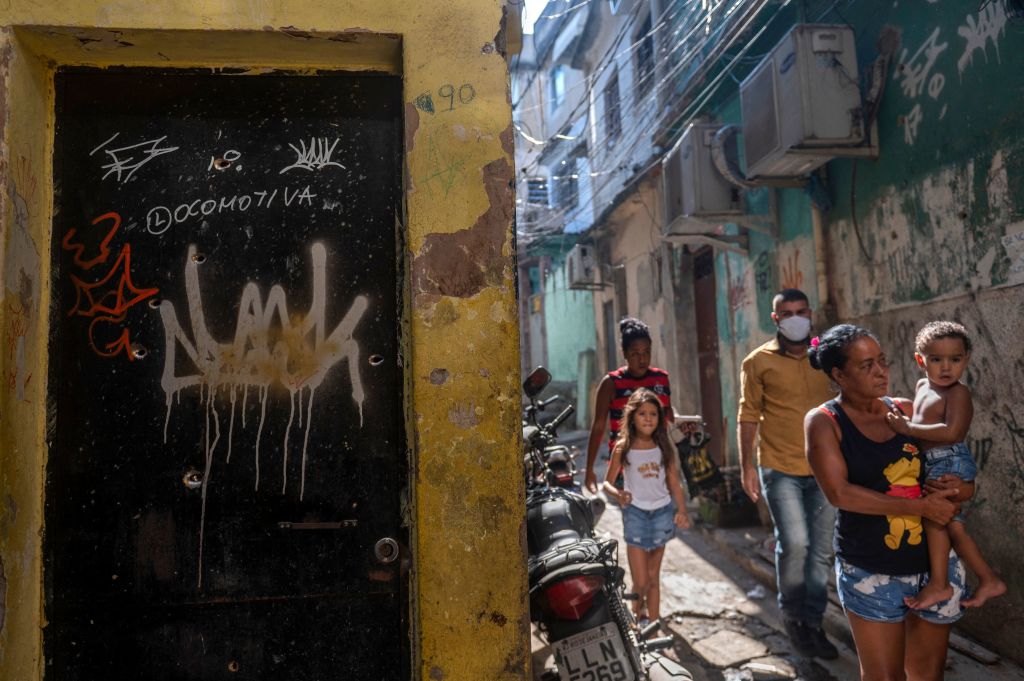 Bullet holes in a doorway in Rio&#039;s Jacarezinho favela.