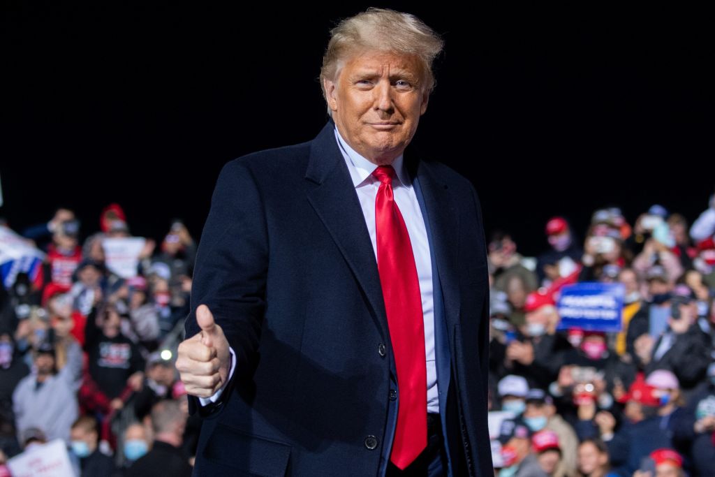 President Donald Trump gives a thumbs up as he arrives to hold a Make America Great Again rally as he campaigns at John Murtha Johnstown-Cambria County Airport in Johnstown, Pennsylvania, Oct