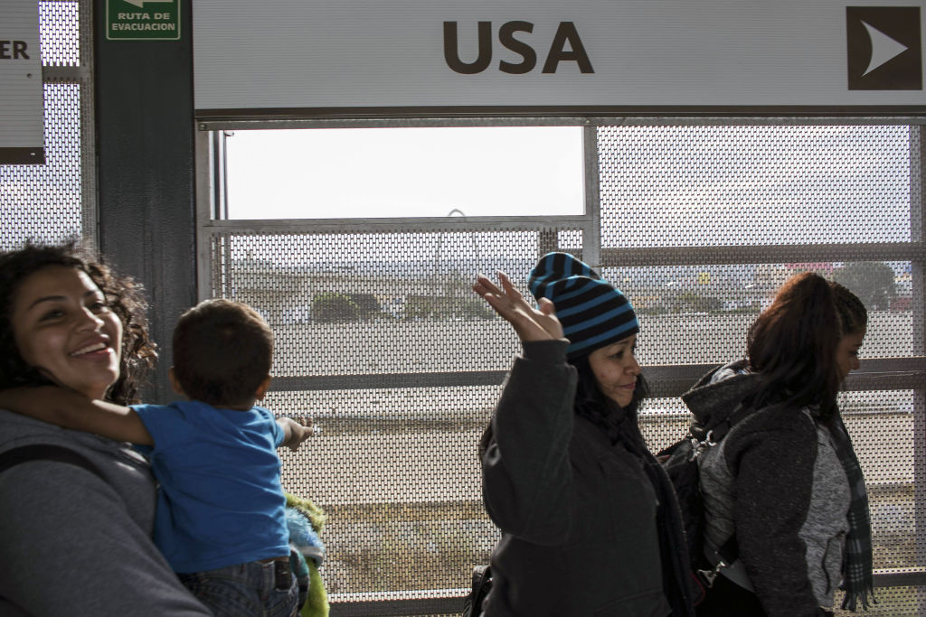 Central Americans seeking asylum try to enter the U.S.