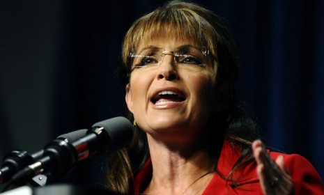 Sarah Palin, quoting Ronald Reagan, says playing with inflation is &quot;as deadly as a hit man.&quot;