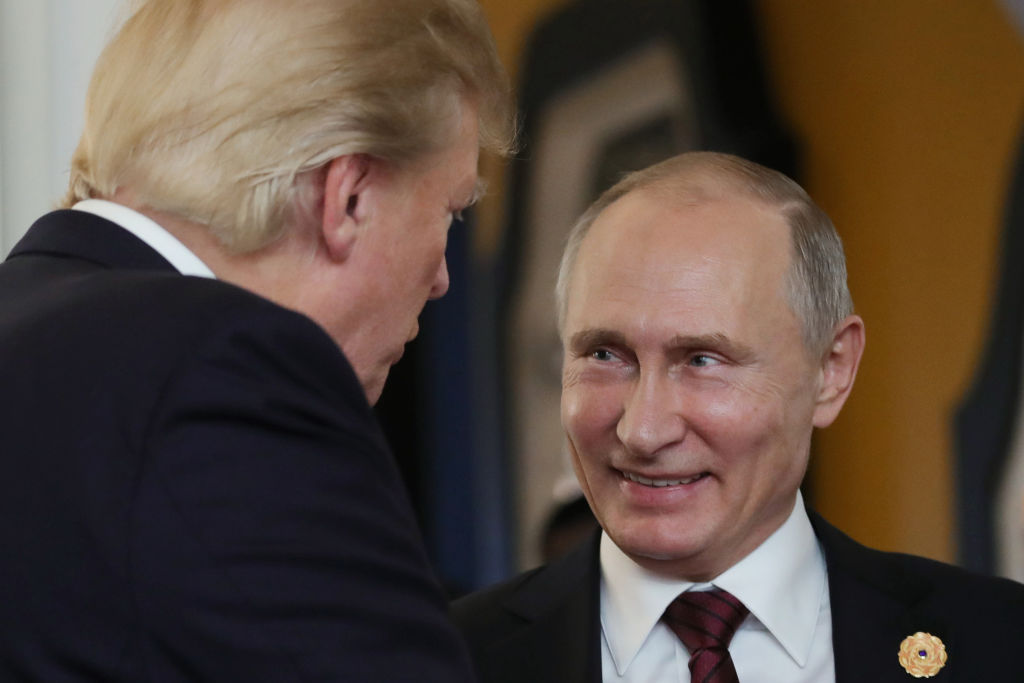 Donald Trump and a grinning Vladimir Putin.
