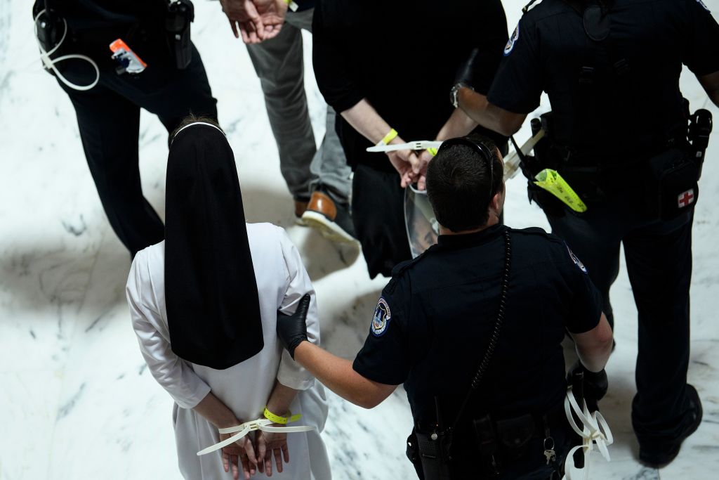 Capitol Police arrest a nun protesting Trump&#039;s immigration policies.