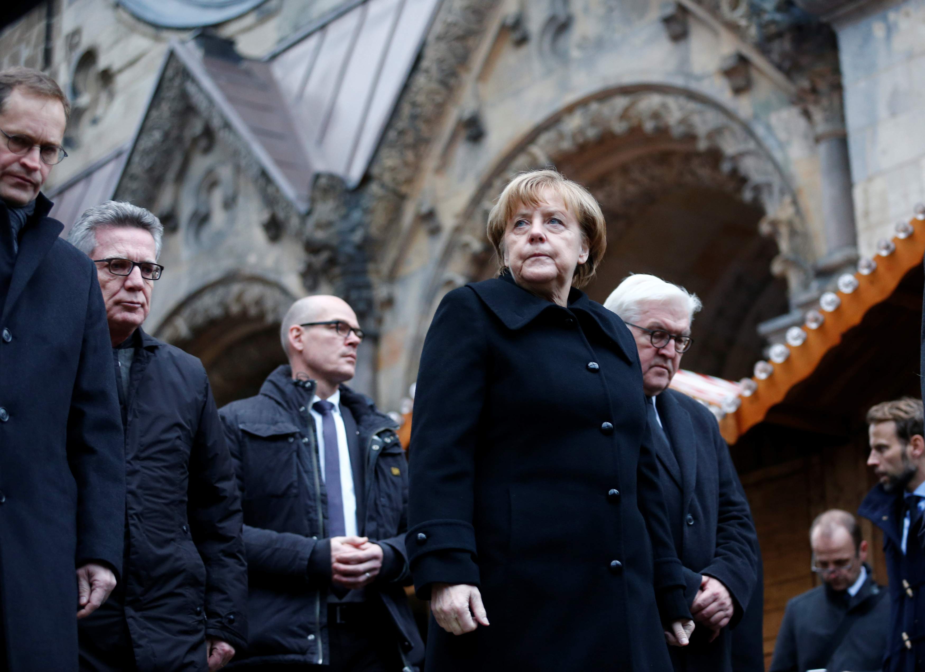 Angela Merkel visits the site of the Christmas market attack.