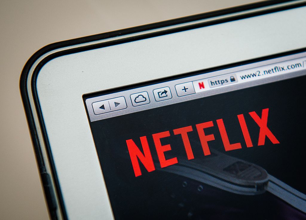 The Netflix logo on a tablet screen