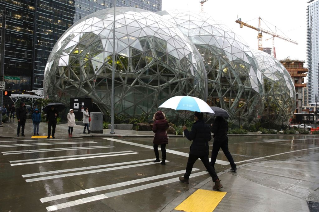 Seattle approves a scaled-down tax over Amazon&#039;s objections.
