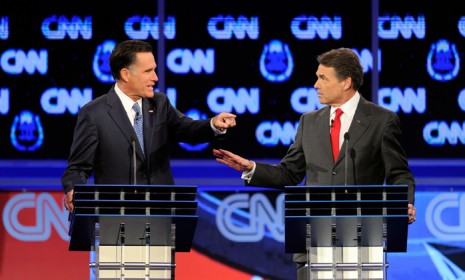 Mitt Romney and Rick Perry sparred during Tuesday&#039;s GOP presidential debate in Las Vegas, which proved to be far more testy than previous Republican face-offs.