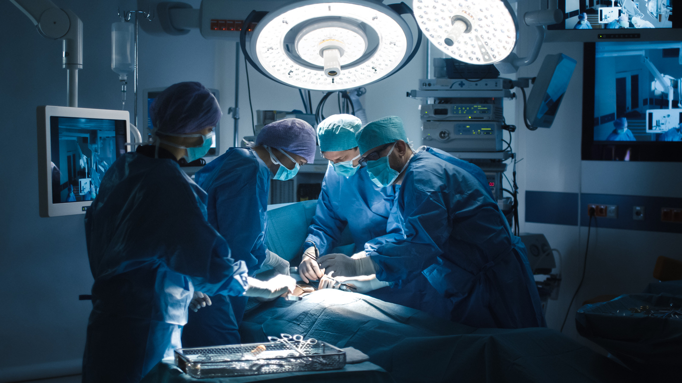Surgeons perform operation