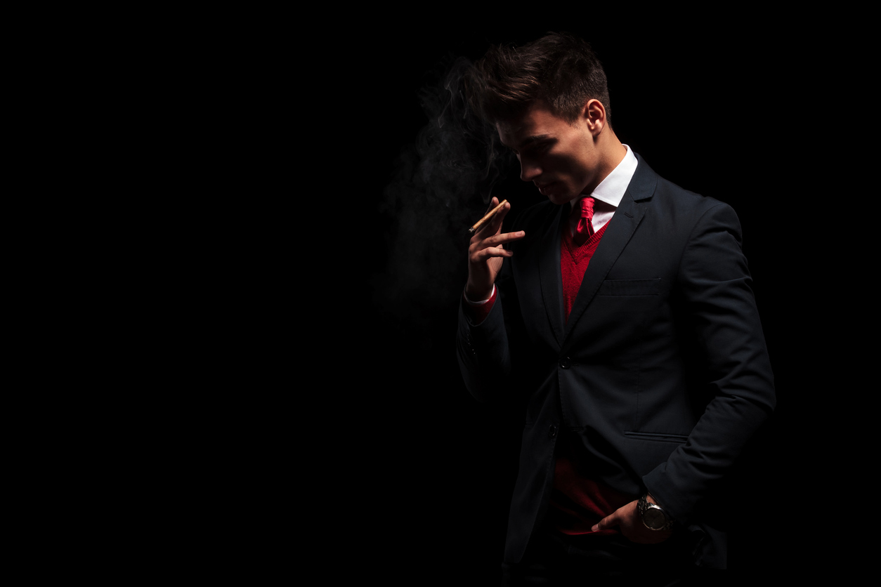 Businessman smoking.