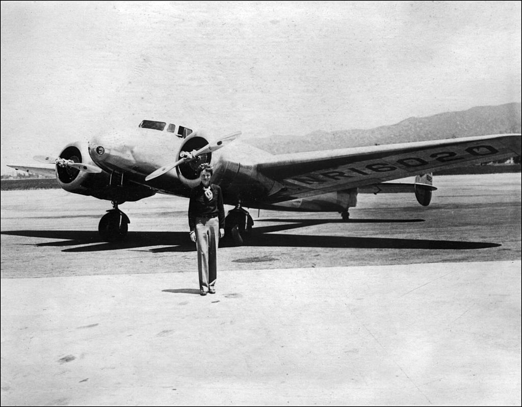 Amelia Earhart and plane.