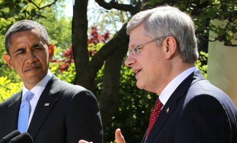 President Obama and Canadian Prime Minister Stephen Harper during a White House press conference April 2