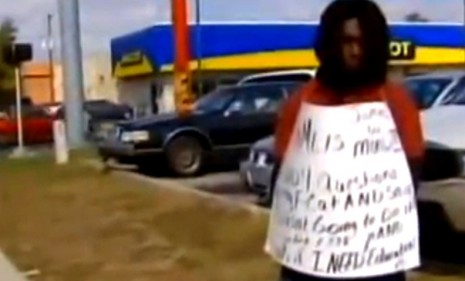A Florida mother whose son earned a woeful 1.222 GPA is making him stand on the sidewalk wearing a sign that says &quot;Honk if I need [an] education.&quot;