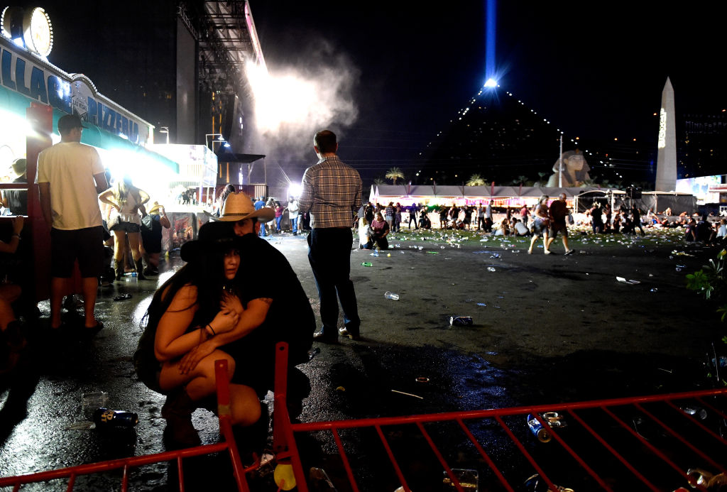 Concertgoers take cover from shooting in Las Vegas.