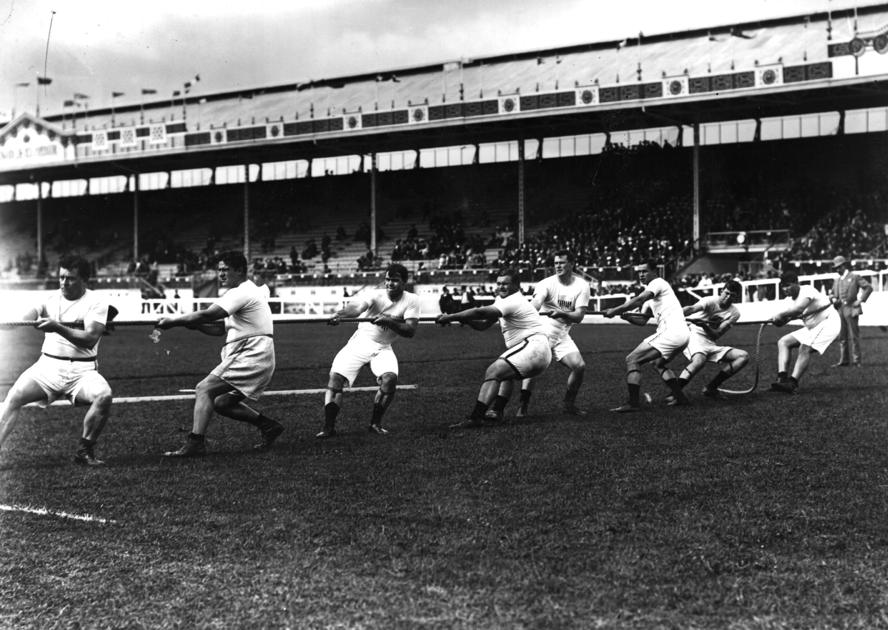 The U.S. Tug of War team compete in the 1908 Olympics in London.