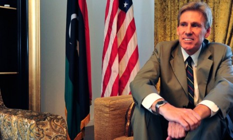 Chris Stevens, the late U.S. ambassador to Libya, smiles at his home in Tripoli on June 28: Ever since his days in the Peace Corp three decades ago, Stevens wanted to be an ambassador.