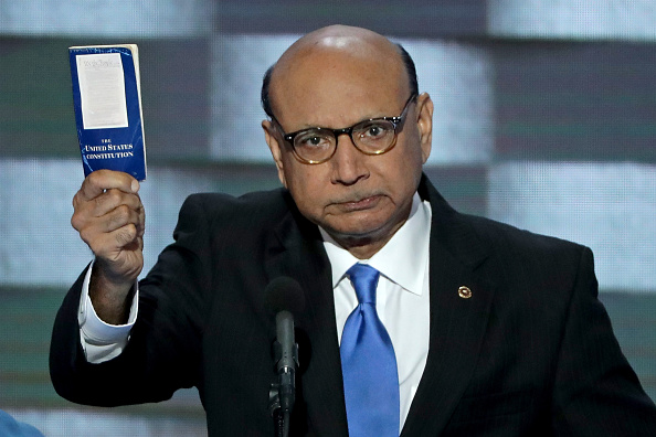 Khizr Khan holds up his copy of the United States Constitution during the Democratic National Convention.