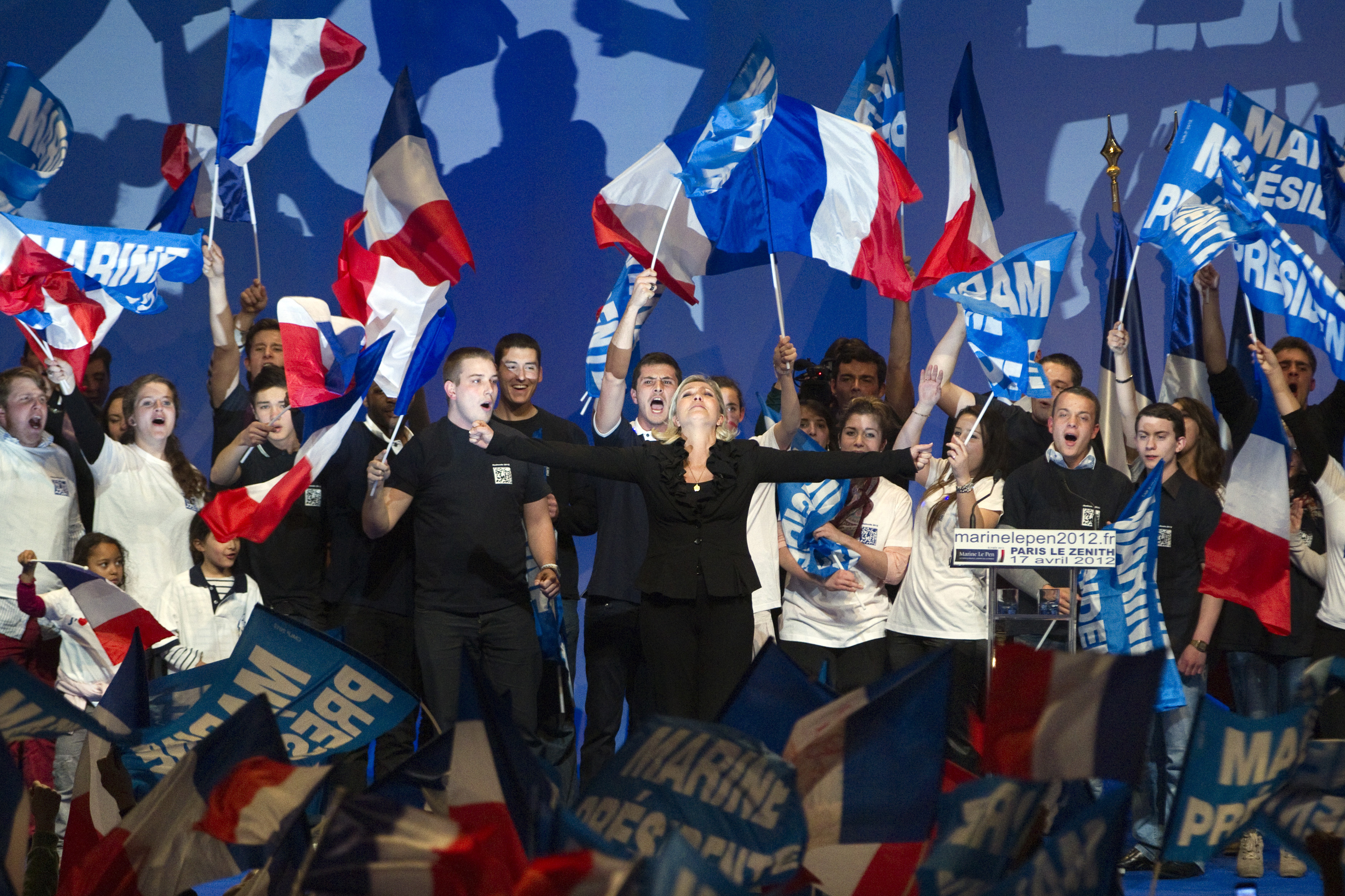 Marine Le Pen and her supporters sing the French national anthem.