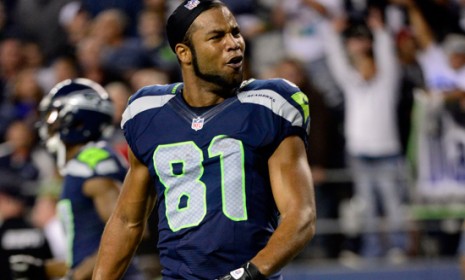 Seattle Seahawks wide receiver Golden Tate celebrates his winning touchdown after a controversial call made by the NFL&#039;s less-than-stellar replacement refs.