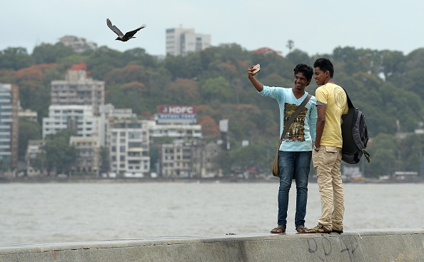 Students take a selfie in Mumbai. 