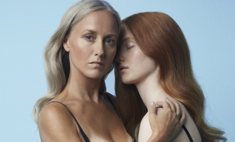 A lingerie company insists that it intended only to spark thoughtful debate with an ad campaign featuring this scantily-clad mother-daughter duo.