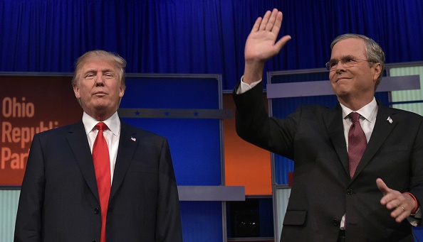 Donald Trump and Jeb Bush on the debate stage. 