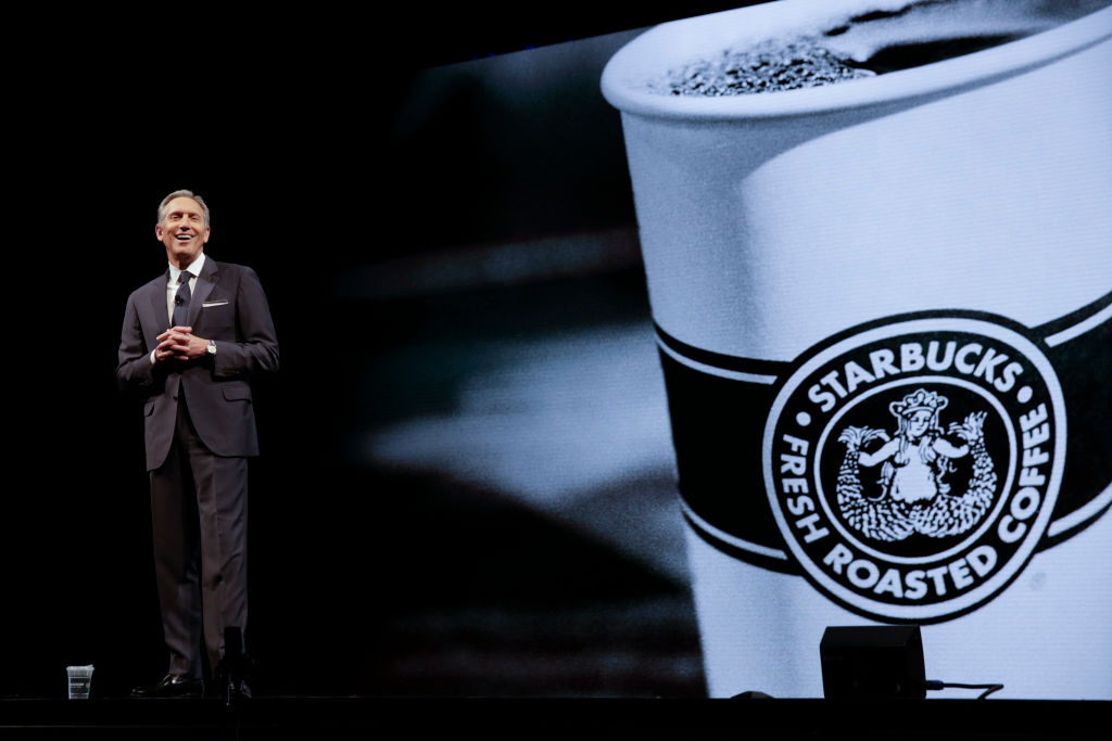 Starbucks executive chairman Howard Schultz speaks at a shareholder meeting in March.
