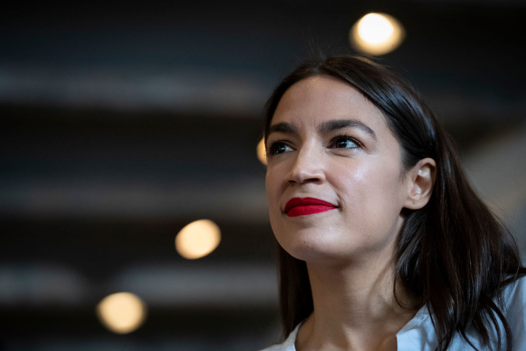 Rep. Alexandria Ocasio-Cortez (D-NY) prepares to wait tables at the Queensboro Restaurant, May 31, 2019 in the Queens borough of New York City.