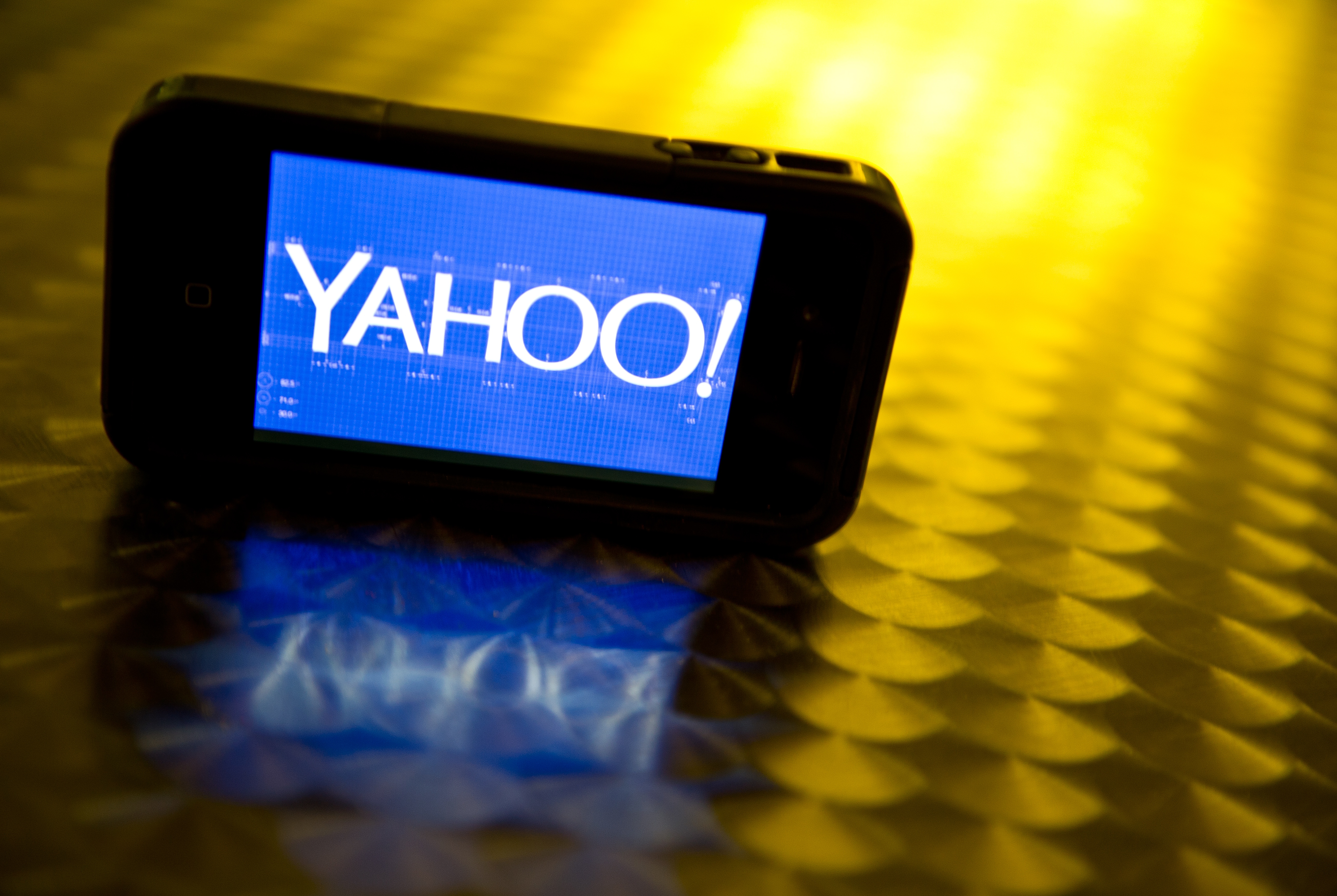 The Yahoo logo on a smartphone
