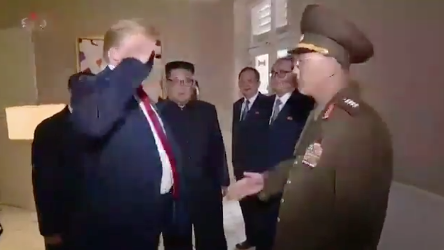 Trump saluting North Korean officer. 