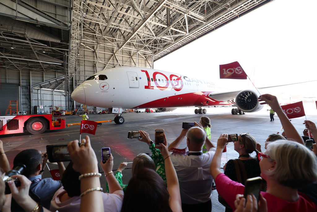 The Qantas flight arrives in Sydney from London.